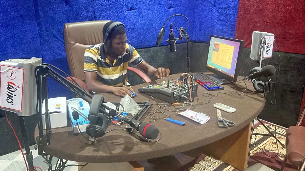 Student engineer at the Iwins Radio mixing desk